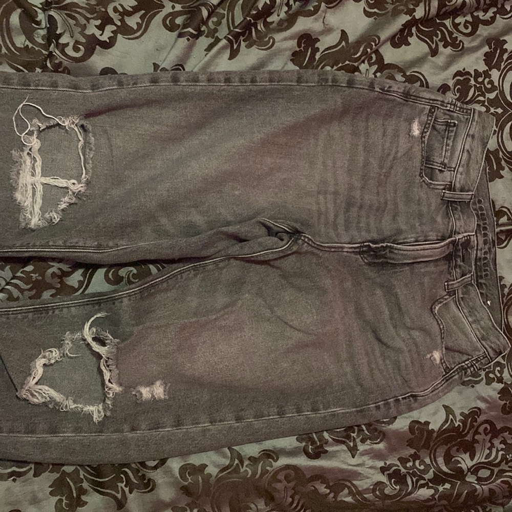 i’m selling dark grey ripped jeans from american eagle